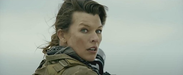 Monster Hunter: Milla Jovovich s rotačním kulometem se pouští do prvního střetu s písečným monstrem | Fandíme filmu